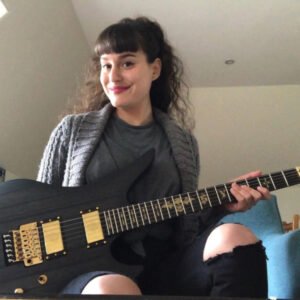 Clara(A Fan Of Synyster Gates) and a Schecter Guitar