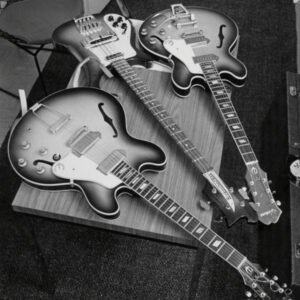 Set Of Two Epiphone Guitars And A Rickenbacker Bass 